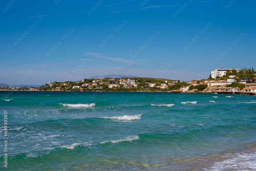Closeup of sand on beach and blue summer sky. Panoramic beach landscape. Empty tropical beach and seascape