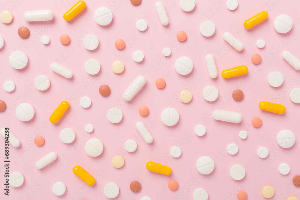 Flat lay with different medical pills and capsules on color background Flat lay with different medical pills and capsules on color background