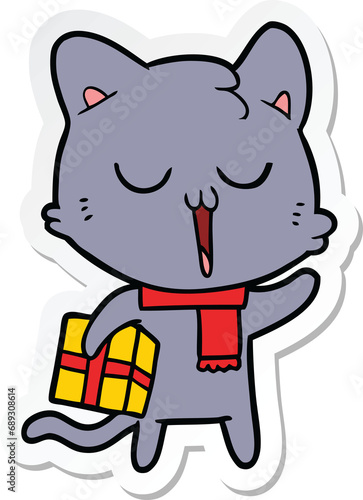 sticker of a cartoon cat with gift