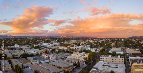Aerial view of the Mar Vista neighborhood with the city of Los  Angeles and the Santa Monica mountains in the background. Take during sunset with a drone.