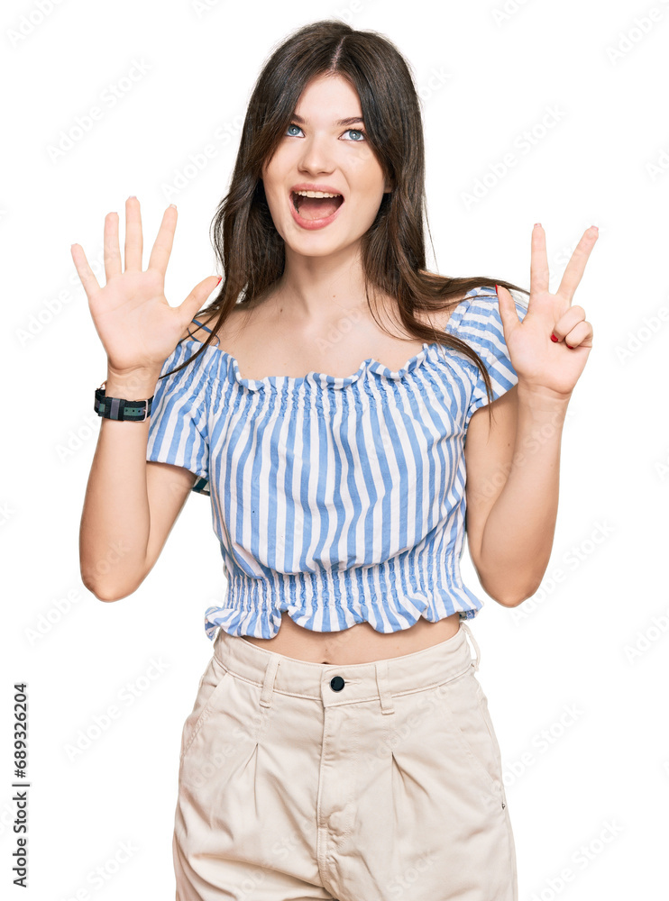 Young beautiful caucasian girl wearing casual clothes showing and pointing up with fingers number eight while smiling confident and happy. Young beautiful caucasian girl wearing casual clothes showing and pointing up with fingers number eight while smiling confident and happy.