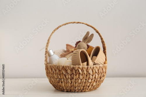 Gift basket for baby on lig...