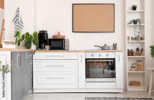 Interior of light kitchen w...