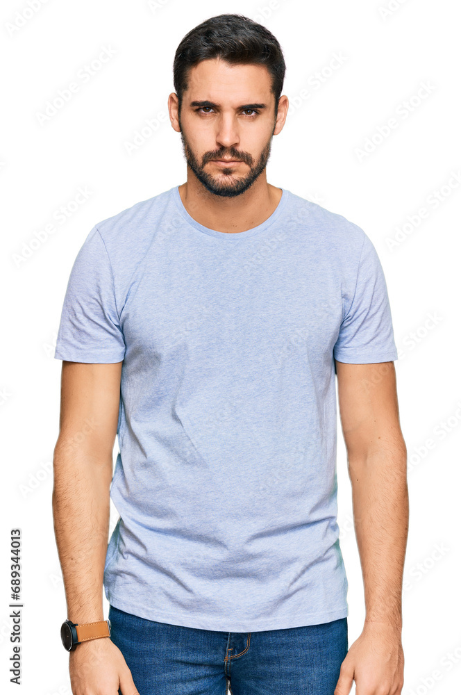 Young hispanic man wearing casual clothes skeptic and nervous, frowning upset because of problem. negative person. Young hispanic man wearing casual clothes skeptic and nervous, frowning upset because of problem. negative person.