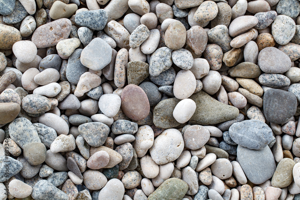 Pebbles grey, large round beach sea stones, close-up, top view Pebbles grey, large round beach sea stones, close-up, top view
