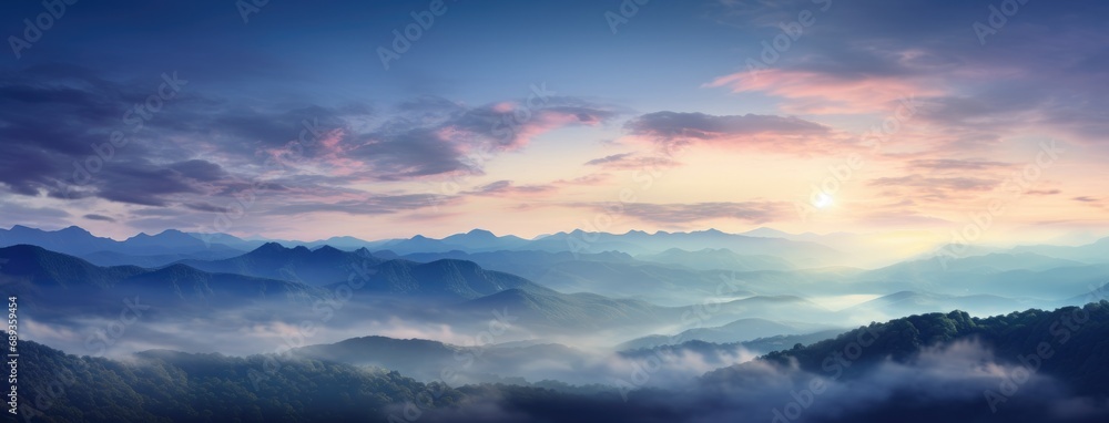 fog and a mountain top at sunset,