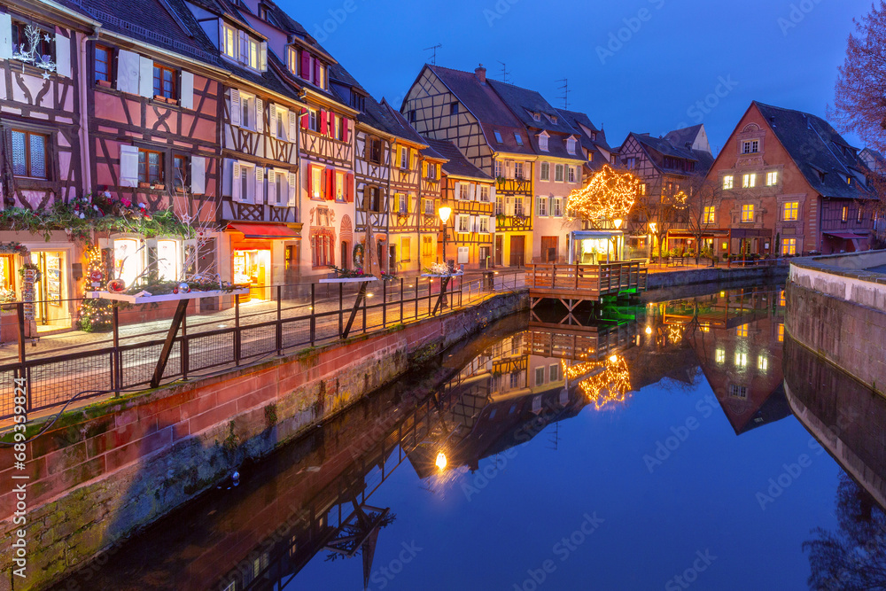 Traditional half-timbered houses in old town of Colmar at Christmas time, Alsace, France