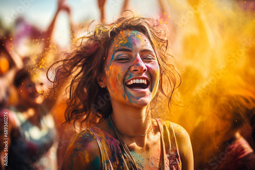Portrait of a young woman at the Holi festival, expressing joy.