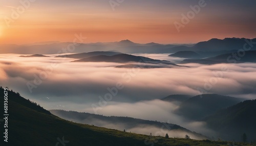 sunrise view over the foggy mountains 