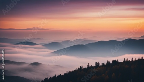 sunrise view over the foggy mountains 