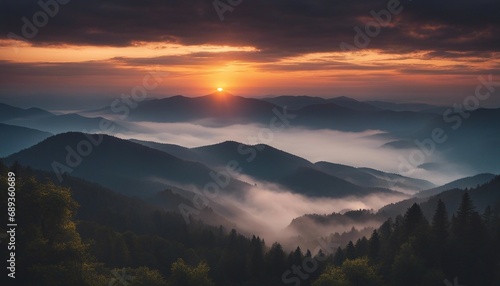 sunrise view over the foggy mountains 