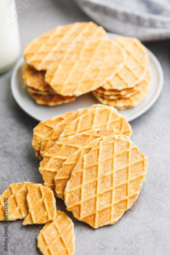 Round waffle biscuits on kitchen table.