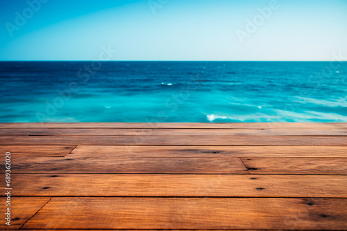 Empty wooden table against the background of the ocean.