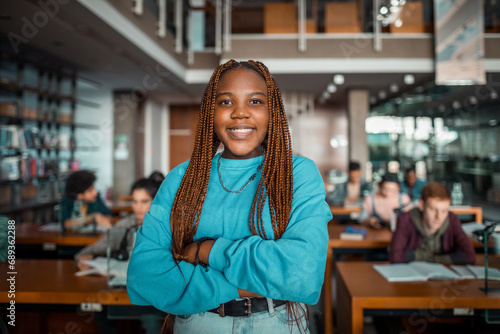 Portrait of a confident African American female student in university photo