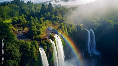 Majestic waterfalls in a lush forest rainbow in the mist --ar 16:9 --v 5.2 --style raw