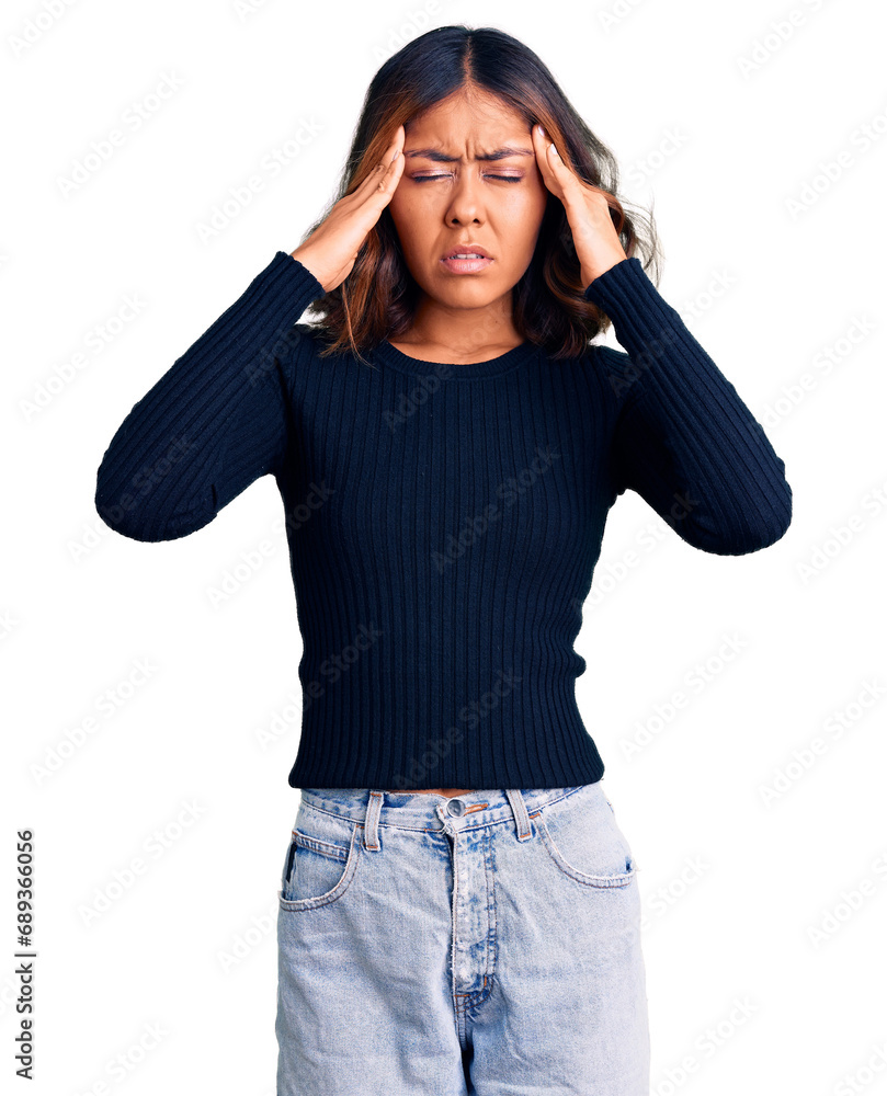 Young beautiful mixed race woman wearing casual clothes with hand on head for pain in head because stress. suffering migraine. Young beautiful mixed race woman wearing casual clothes with hand on head for pain in head because stress. suffering migraine.