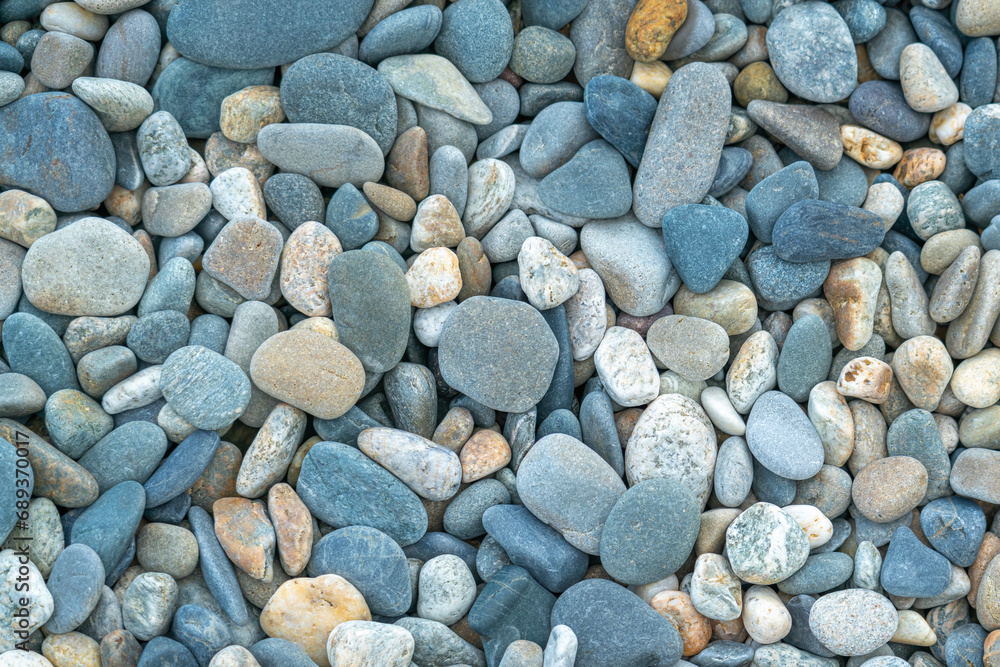 the texture of the pebbles in close-up as a background the texture of the pebbles in close-up as a background