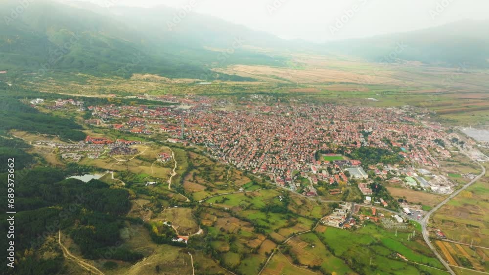 High altitude aerial shot of Bansko, an all season resort next to Bulgarian Pirin mountains. High altitude aerial shot of Bansko, an all season resort next to Bulgarian Pirin mountains.