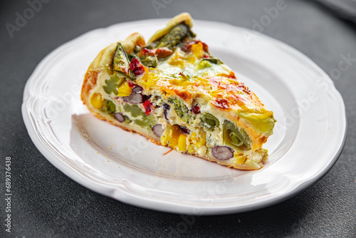 open pie quiche vegetable savory baked corn, green peas, beans, green beans, bell pepper healthy eating cooking appetizer meal food snack on the table copy space food background