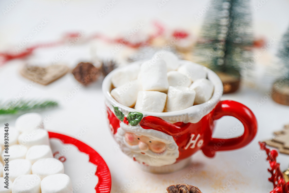 A cup of hot chocolate and marshmallow christmas concept. A cup of hot chocolate and marshmallow christmas concept.