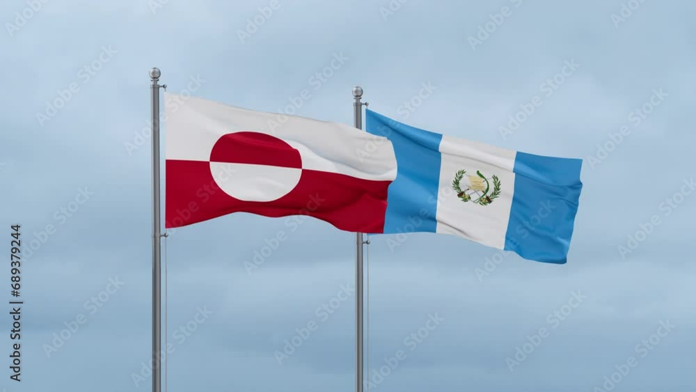 Guatemala flag and Greenland flag waving together on cloudy sky, endless seamless loop, two country relations concept Guatemala flag and Greenland flag waving together on cloudy sky, endless seamless loop, two country relations concept
