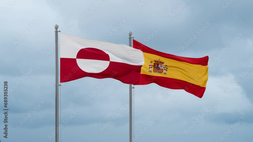Spain and Greenland flag waving together on cloudy sky, endless seamless loop, two country cooperation concept Spain and Greenland flag waving together on cloudy sky, endless seamless loop, two country cooperation concept