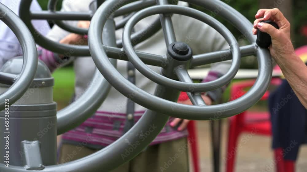 Senior people exercising at the outdoor gym. High quality 4k video Senior people exercising at the outdoor gym. High quality 4k video