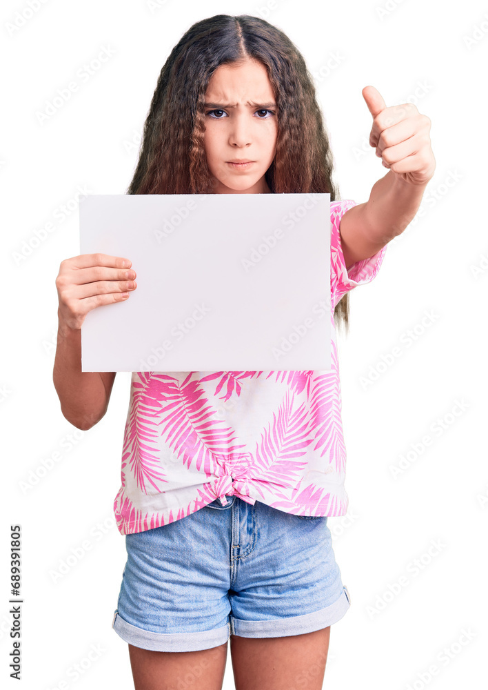 Cute hispanic child girl holding blank empty banner annoyed and frustrated shouting with anger, yelling crazy with anger and hand raised Cute hispanic child girl holding blank empty banner annoyed and frustrated shouting with anger, yelling crazy with anger and hand raised