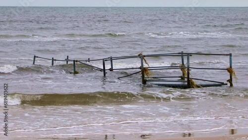 Damaged pier after flood storm in Ishoj Denmark 20 October 2023 Koge bugt photo