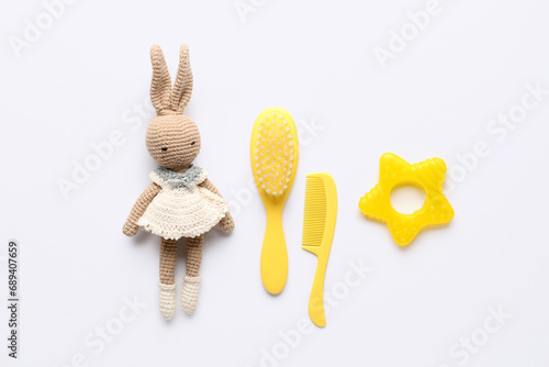 Baby knitted toy, combs and...