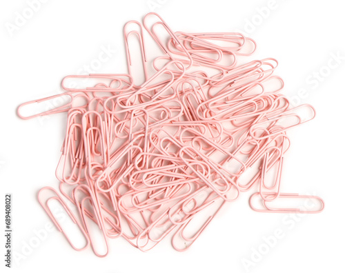 Pink paper clips on white b...