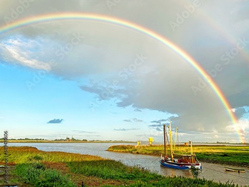 Early morning, rainbow, Ems, fishing cutter, barge, East Frisia, Germany, Europe photo