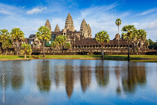 Famous Cambodian landmark and tourist attraction Angkor Wat with reflection in water. Cambodia, Siem Reap photo