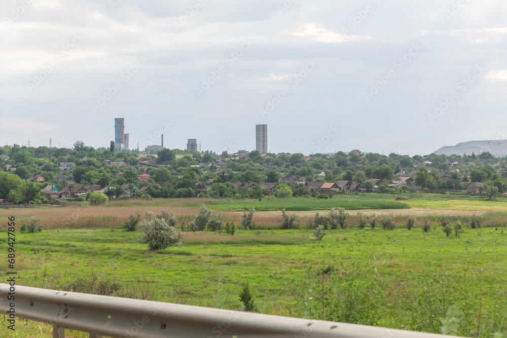 the scenery of factories and farmland in the Donbass region in eastern Ukraine