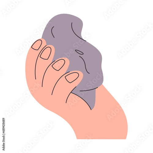 hand holding gray color stone or clay malleable toy for kid fun enjoy play and create handicraft material