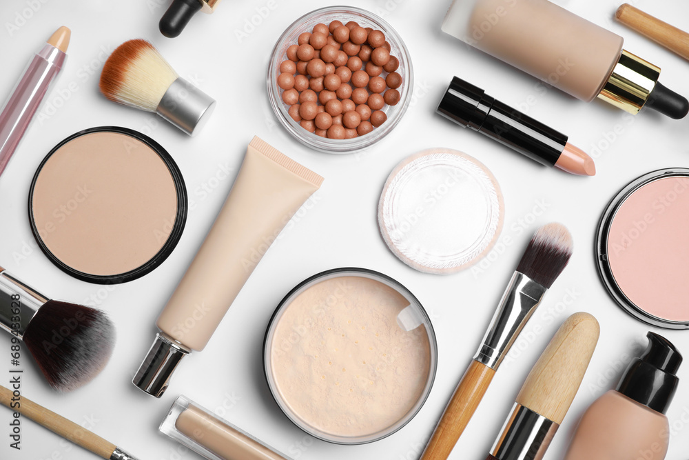 Face powders and other makeup products on white background, flat lay Face powders and other makeup products on white background, flat lay
