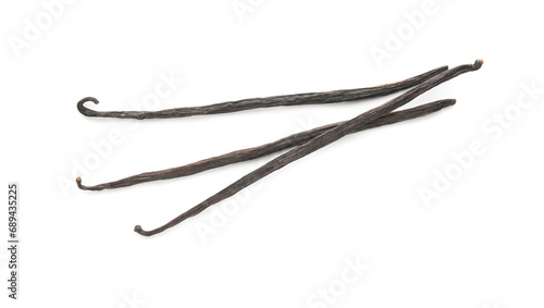 Many aromatic vanilla pods isolated on white, top view