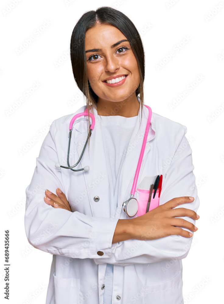 Beautiful hispanic woman wearing doctor uniform and stethoscope happy face smiling with crossed arms looking at the camera. positive person. Beautiful hispanic woman wearing doctor uniform and stethoscope happy face smiling with crossed arms looking at the camera. positive person.