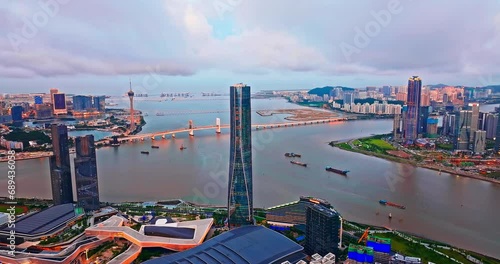 Aerial view of Zhuhai and Macau city skyline with modern buildings scenery at dusk, China. beautiful coastline scenery. Famous travel destination.  photo