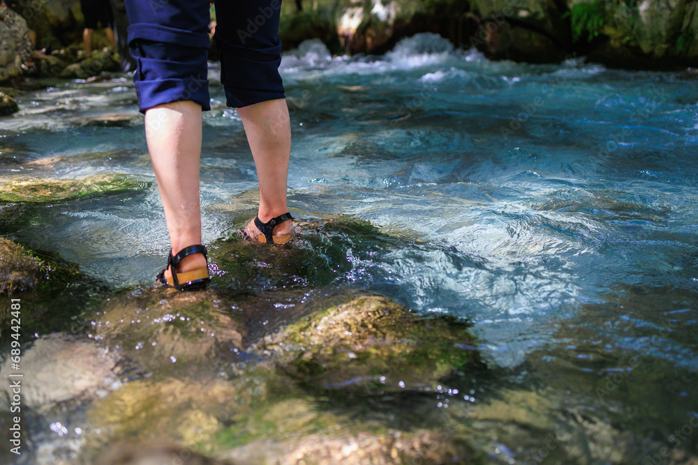 Saklikent Canyon in Turkey with mountain cold stormy water in the river. Natural attraction, popular place for tourists Saklikent Canyon in Turkey with mountain cold stormy water in the river. Natural attraction, popular place for tourists