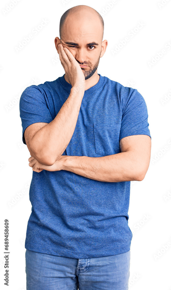 Young handsome man wearing casual t shirt thinking looking tired and bored with depression problems with crossed arms. Young handsome man wearing casual t shirt thinking looking tired and bored with depression problems with crossed arms.