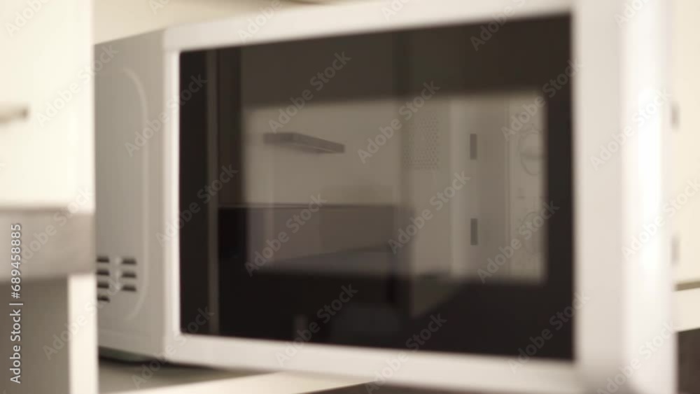 microwave food is warmed up take it out. High quality FullHD footage microwave food is warmed up take it out. High quality FullHD footage
