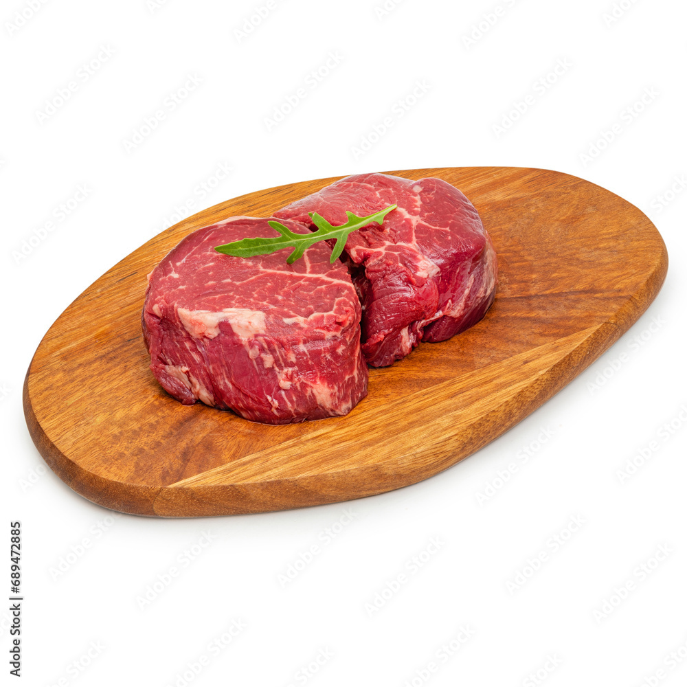 Fresh beef meat, minion steak, on a wooden board, on a white background, isolate Fresh beef meat, minion steak, on a wooden board, on a white background, isolate