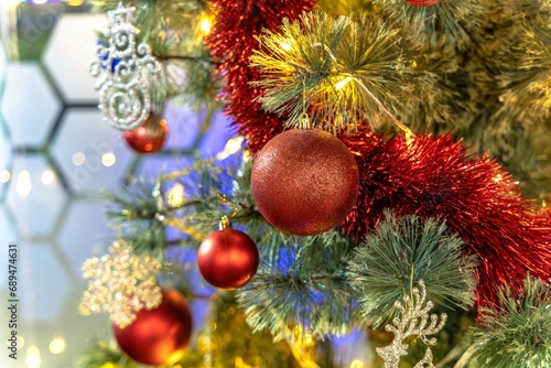 Background with blur on the theme of Christmas or New Year with toys and shining elements