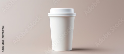 White isolated cup for hot drinks. To-go. photo