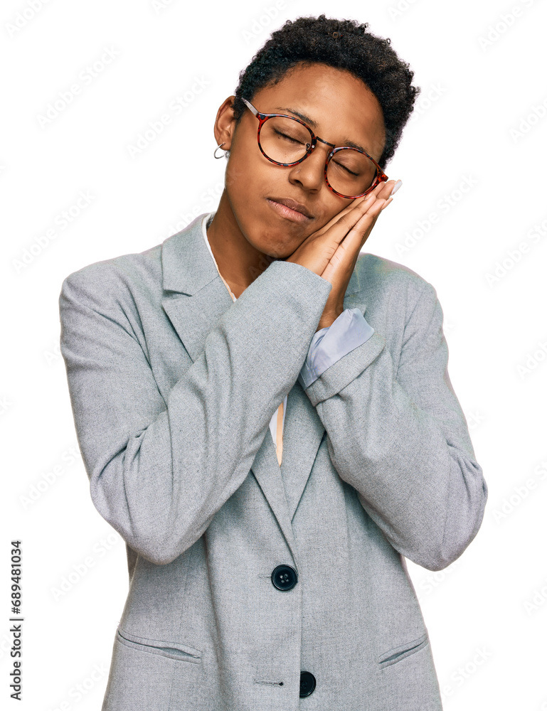 Young african american woman wearing business clothes sleeping tired dreaming and posing with hands together while smiling with closed eyes. Young african american woman wearing business clothes sleeping tired dreaming and posing with hands together while smiling with closed eyes.