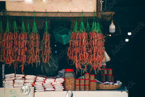 Small shop displaying traditional pork and beef sausages called twa koh, kwah koh or sach krok, authentic khmer cuisine and culture of Cambodia