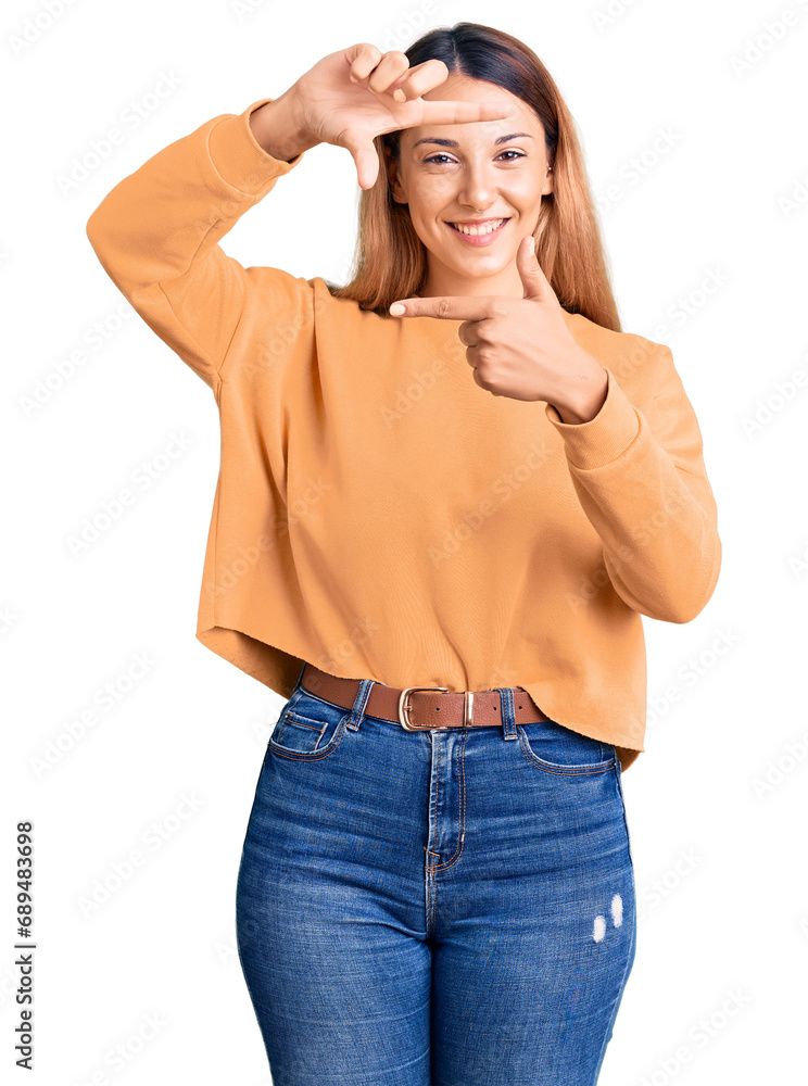 Beautiful young woman wearing casual clothes smiling making frame with hands and fingers with happy face. creativity and photography concept. Beautiful young woman wearing casual clothes smiling making frame with hands and fingers with happy face. creativity and photography concept.