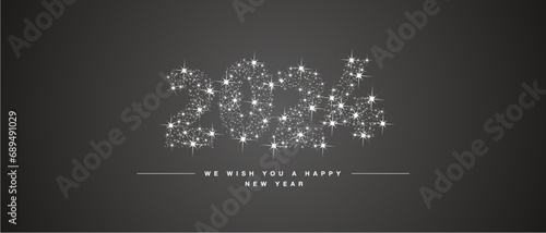 We wish you Happy New Year 2024. Numbers tipography with many stars and stardust in the shape of 2024 on black background