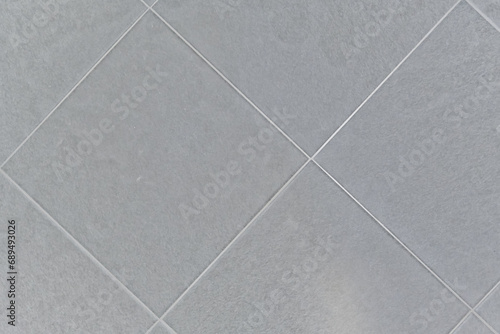 Gray floor tiles are resistant to stains and are easy to maintain